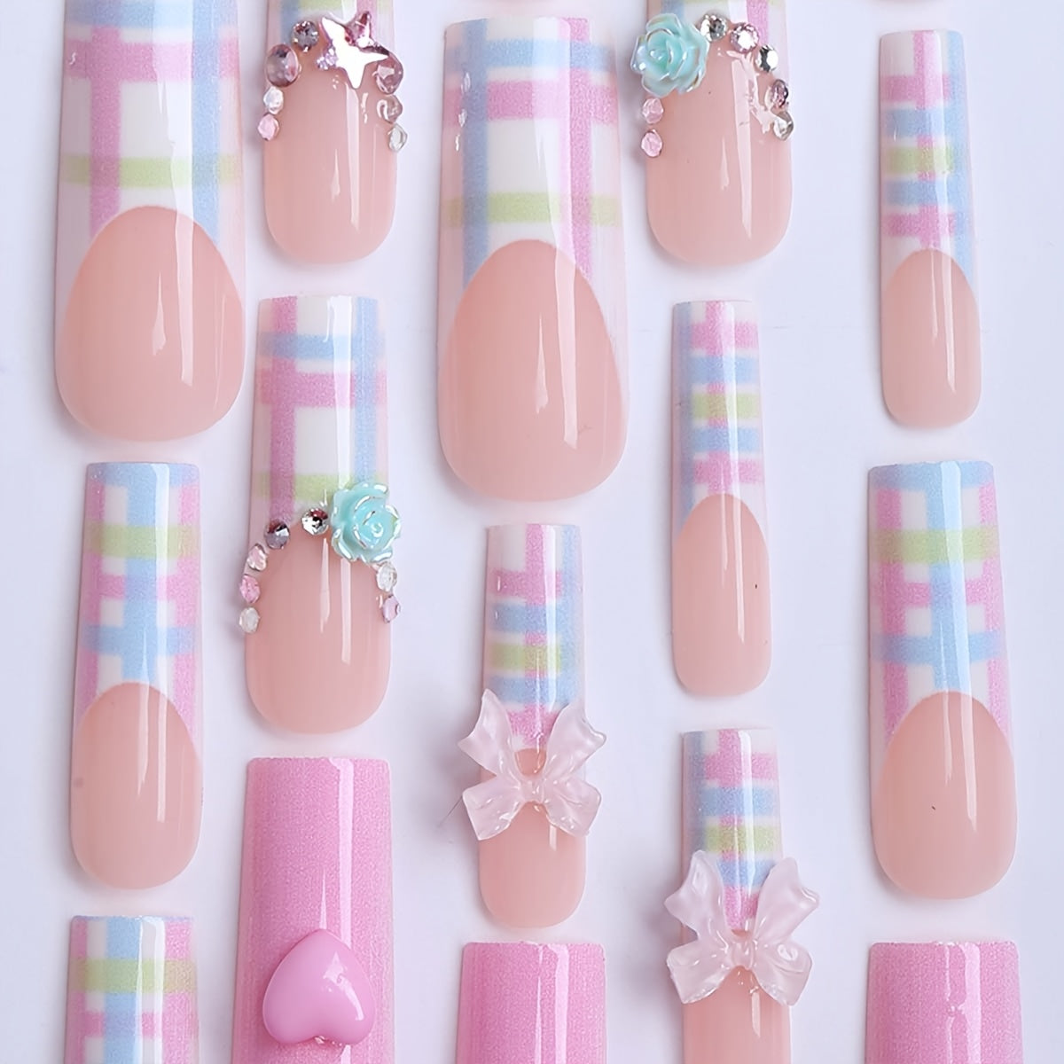 A Gift Box Containing 24 Long Square-Shaped Press-On Nails for Spring And Summer, Featuring Cute Dopamine Designs with Milky White Bows, Pink 3D Hearts, Rainbow Checkered Stripes, Aurora Blue-Green Camellias, Silvery Glitter,