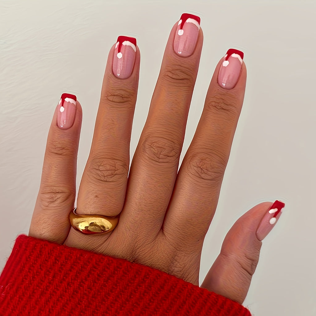Christmas Nails Featuring 24 Fake Nails with a Red French Christmas Hat Design Adorned with a White Dot, Perfect for And Women. Ideal for Holiday Parties, Gifts, And Everyday Wear, These Are Pressed Onto Acrylic Nails for a F
