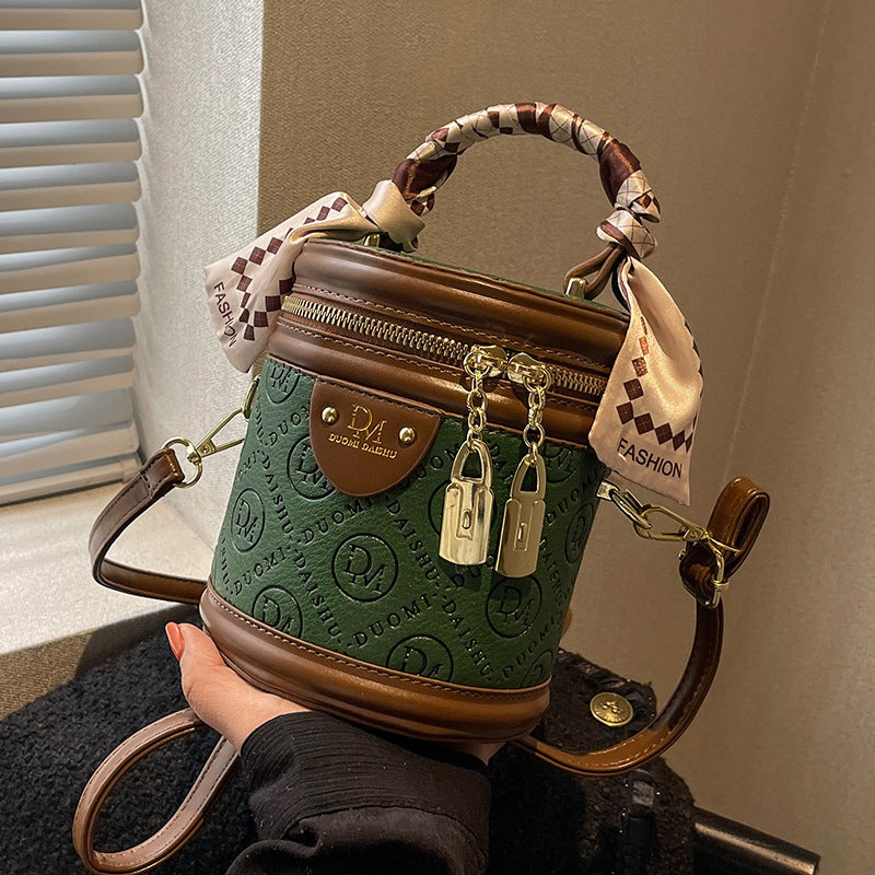 Chic Green Bucket Bag for Women - Stylish Crossbody with Golden-Tone Hardware, Zipper Closure, and Checkered Bow Accents - Perfect for Casual or Formal Outfits, Casual Accessory | Checkered Bow Accent | Zipper Closure Bag
