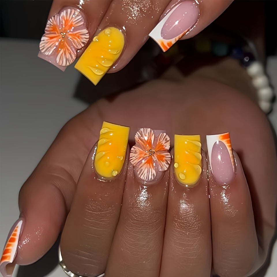 A Set of 24 Short Square False Nails with Warm Summer Orange And Yellow Flowers, Cool Dew Drops, Moist Ripples, Light Luxury Golden Beads Suitable for All Women And Girls. The Box Comes with a Nail Polish And Jelly Glue, Whic