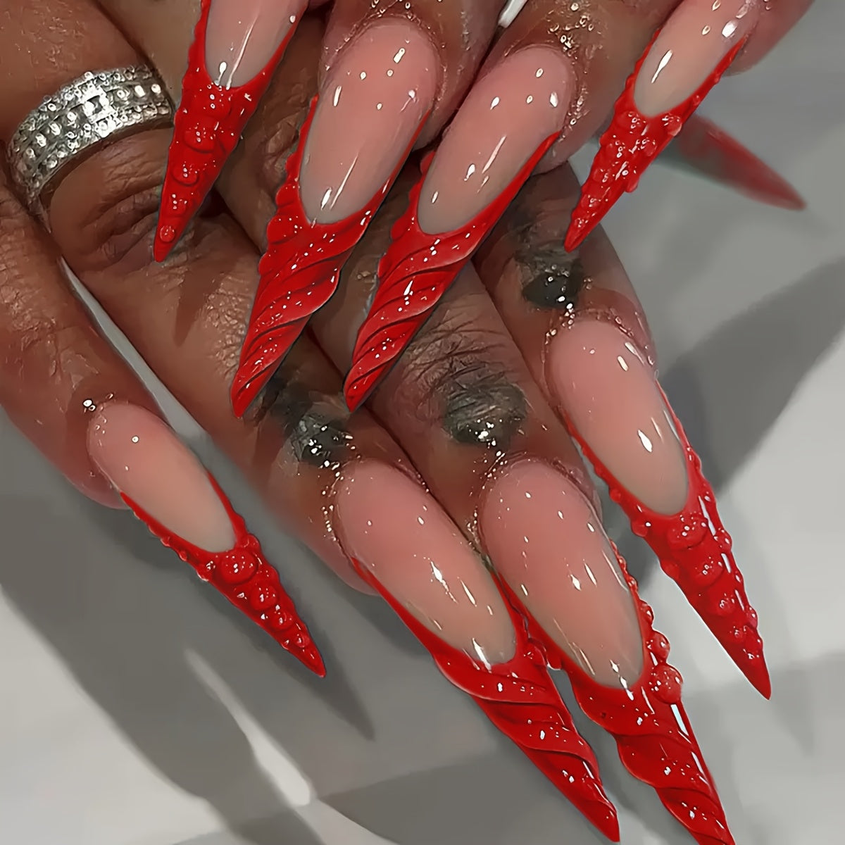 A Set of 24 Long Almond-Shaped False Nails French Style Bright Fiery Red Glossy Shiny Fashionable Spiral Moist Round Beads Suitable for All Women And. The Box Comes with a Nail Polish And Jelly Glue, Which Is Easy to Stick An
